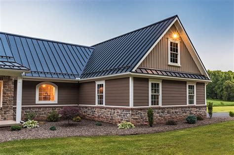 brick house with brown metal roof|houses with metal roofs pictures.